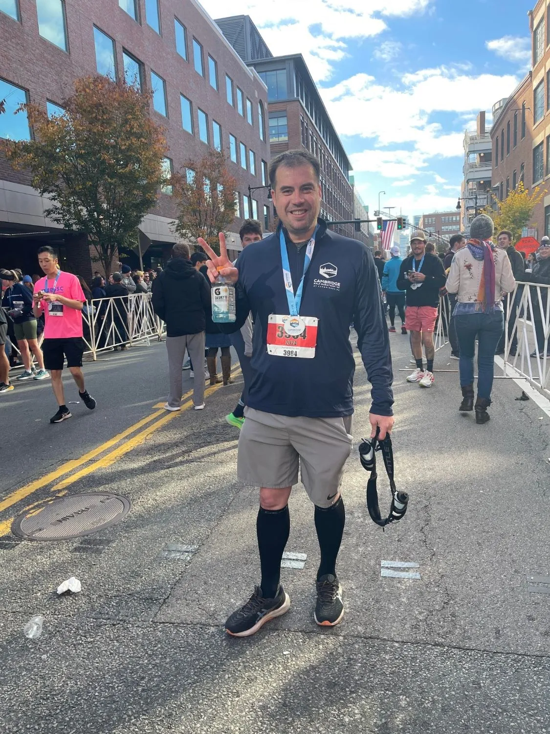 Chris with his finisher medal after the 2024 Cambridge Half Marathon